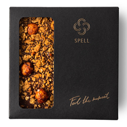 Chocolate with salted caramel, caramelized flakes and hazelnuts